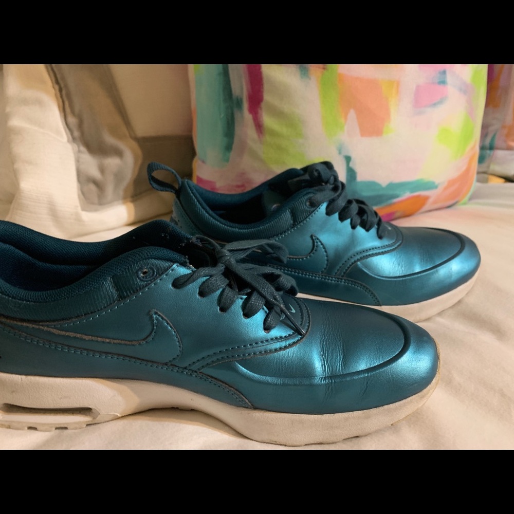 Blue nike air running shoes